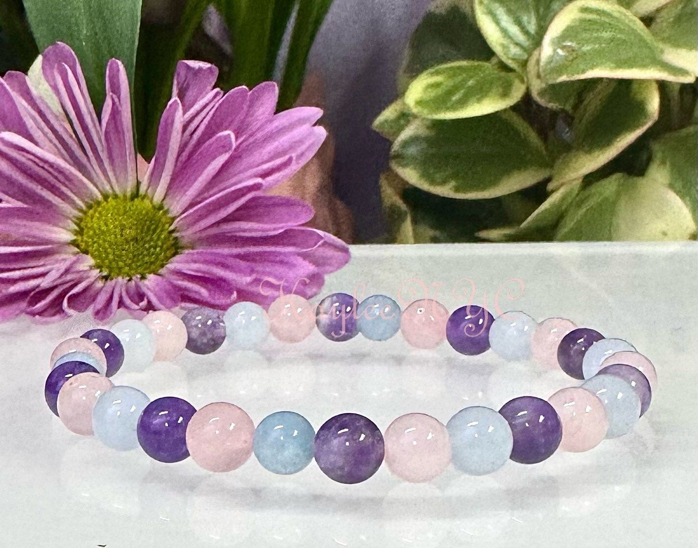 Wholesale 6 Pcs Natural Crystal Bracelet 6mm 7.5” Stretch Bracelet Crystal, Amethyst, Rose Quartz, and Aquamarine.