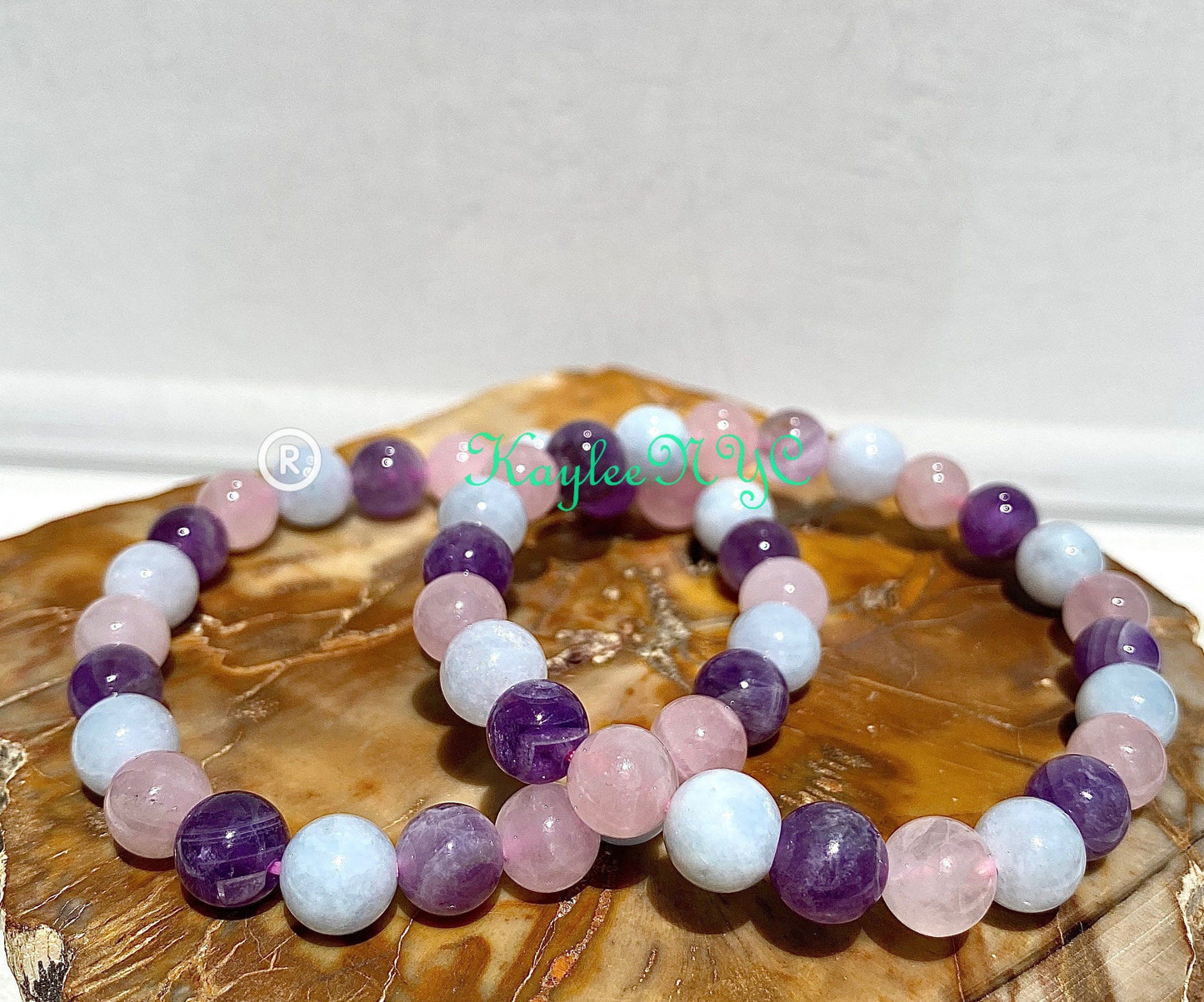 Wholesale 6 Pcs Natural Crystal Bracelet 8mm 7.5” Stretch Bracelet Crystal, Amethyst, Rose Quartz, and Aquamarine.