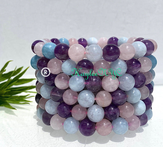 Wholesale 6 Pcs Natural Crystal Bracelet 8mm 7.5” Stretch Bracelet Crystal, Amethyst, Rose Quartz, and Aquamarine.